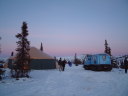 yurt and snowcat on Charley dome sunset